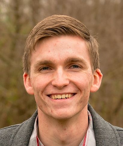 A headshot of John Lund