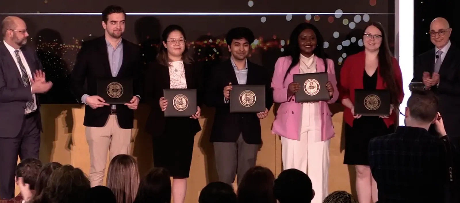 Receiving the Outstanding Graduate Award in Research