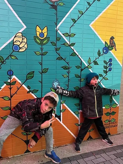 My sons in front my sister Holly’s mural in London Ontario 2022