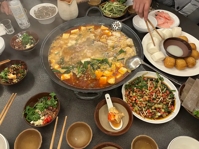 hotpot from my hometown - the soup base is fermented pepper and tomato