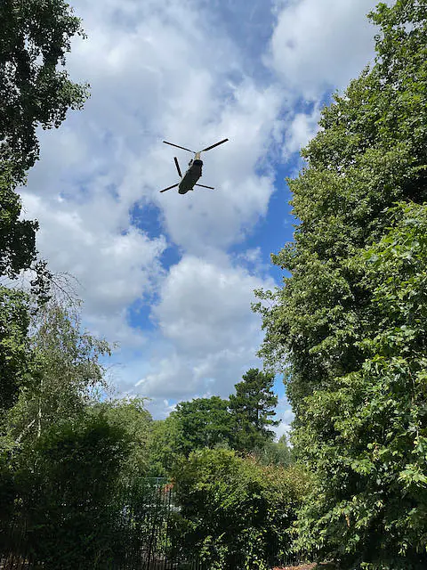 A helicopter flies over St. Regent's Park