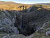 Slovenia, Divača (2025): View towards the karst sinkholes (dolines) at the Škocjan Caves