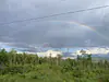 A break from rain in the field with a rainbow over Abenaki Land of the Wabanaki Nations, People of the First Light.