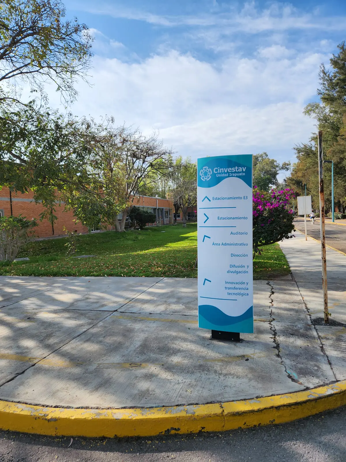 Sidewalk with street sign