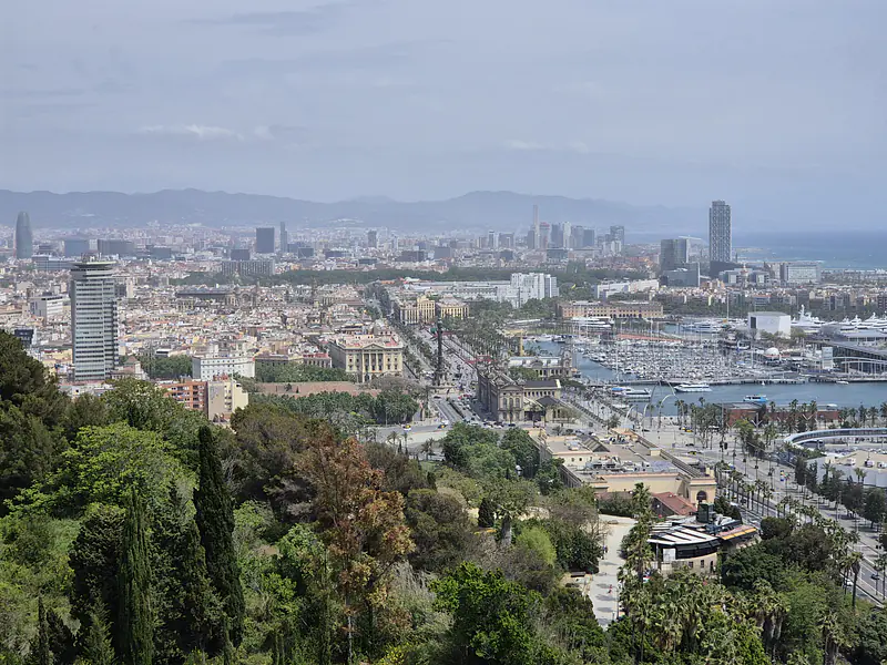 Spain, Catalonia, Barcelona (2026): View towards central districts and the controversial Christopher Columbus Monument from Montjuïc
