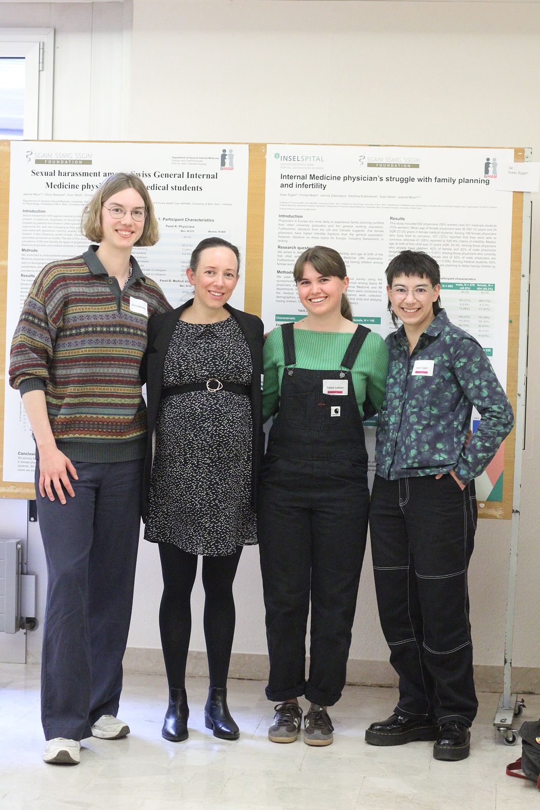 Olivia with Jeanne, Tabea and Isaac with their posters at the FELS Research Day