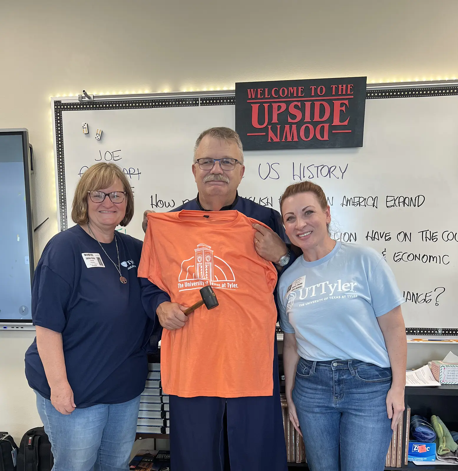 Visiting an ed leadership student while he was teaching on his campus to bring him a UTT shirt.