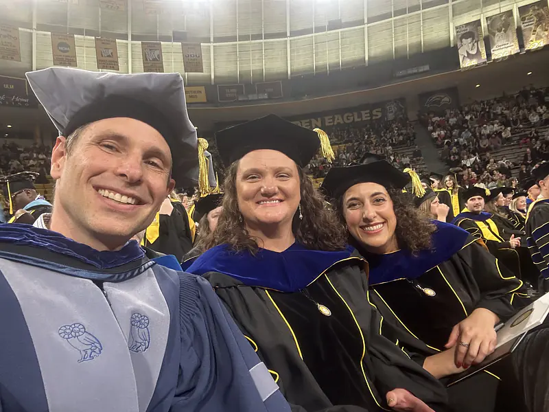 PhD Graduation day with advisor Dr. Davin Wallace and lab mate Dr. Carrie Miller