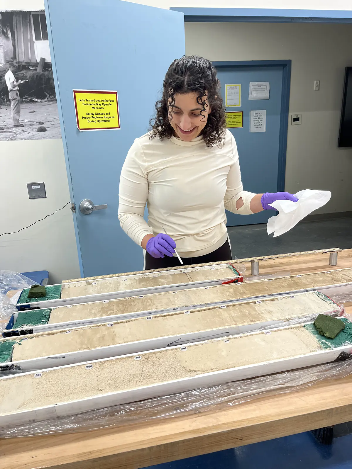 Sampling a deep sea sediment core collected in the WNP, near Pohnpei