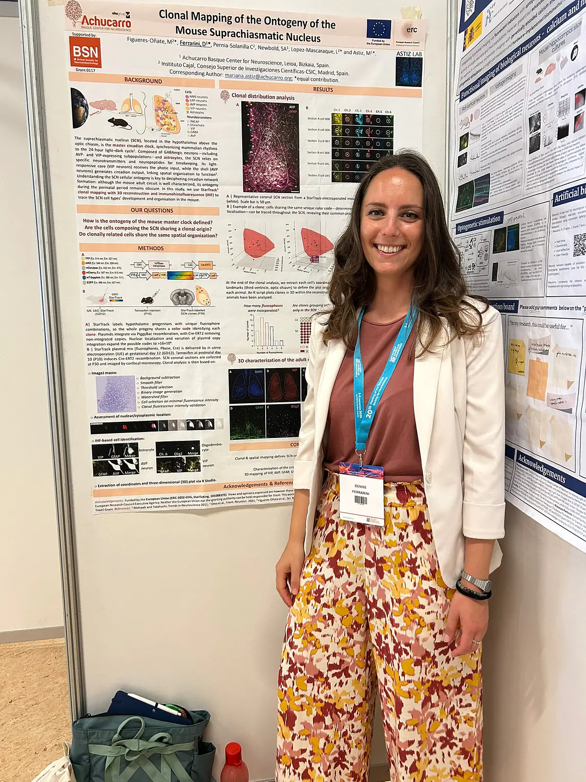 Denise presenting her poster at SENC.