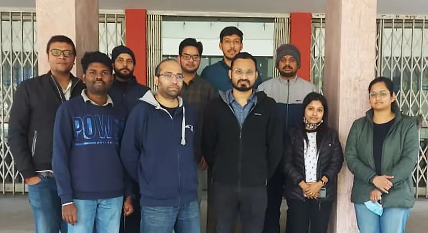 Photo of the DiRaC laboratory personnel in front of the ECE Department building (April 20th, 2022). 